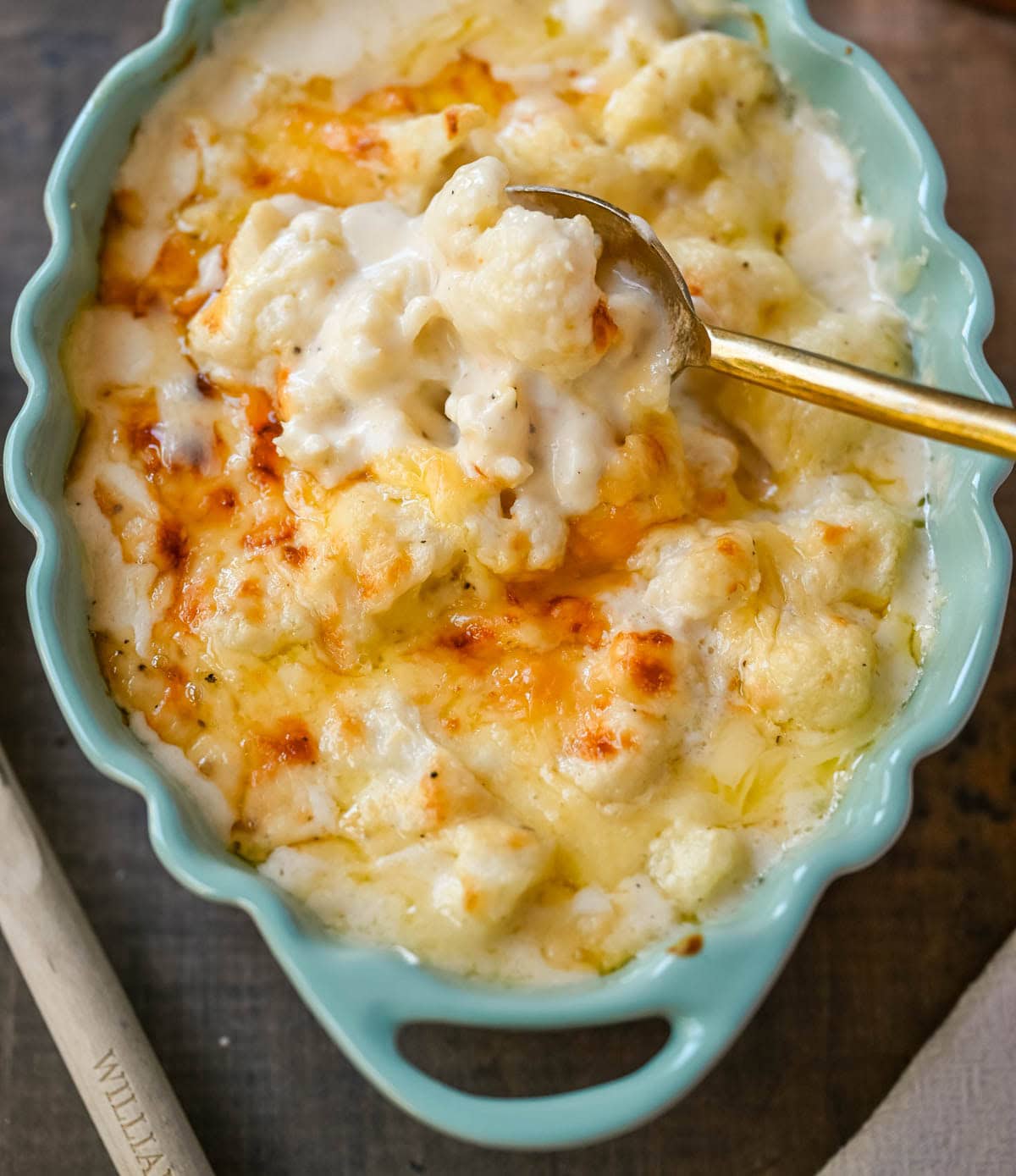 This easy creamy cauliflower gratin is the perfect cheesy side dish for Thanksgiving, Christmas, or any dinner. Made with Gruyère, sharp cheddar, and tender cauliflower, it’s a rich, flavorful, and easy side. The best baked cauliflower gratin!