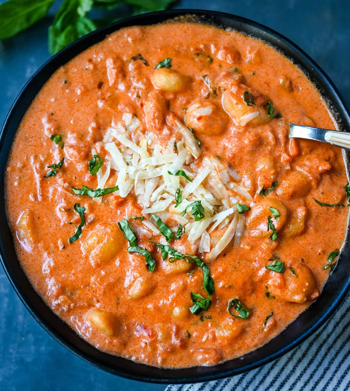 This easy Gnocchi alla Vodka combines soft, tender gnocchi with a silky, tomato-cream vodka sauce that’s bursting with garlic, parmesan, and fresh basil. This Gnocchi with Tomato Cream Sauce is an easy weeknight dinner but it tastes like it is straight out of an Italian restaurant.