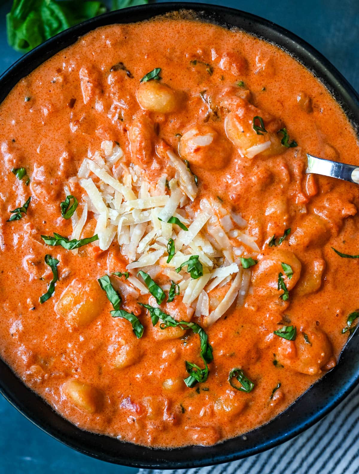 This easy Gnocchi alla Vodka combines soft, tender gnocchi with a silky, tomato-cream vodka sauce that’s bursting with garlic, parmesan, and fresh basil. This Gnocchi with Tomato Cream Sauce is an easy weeknight dinner but it tastes like it is straight out of an Italian restaurant.