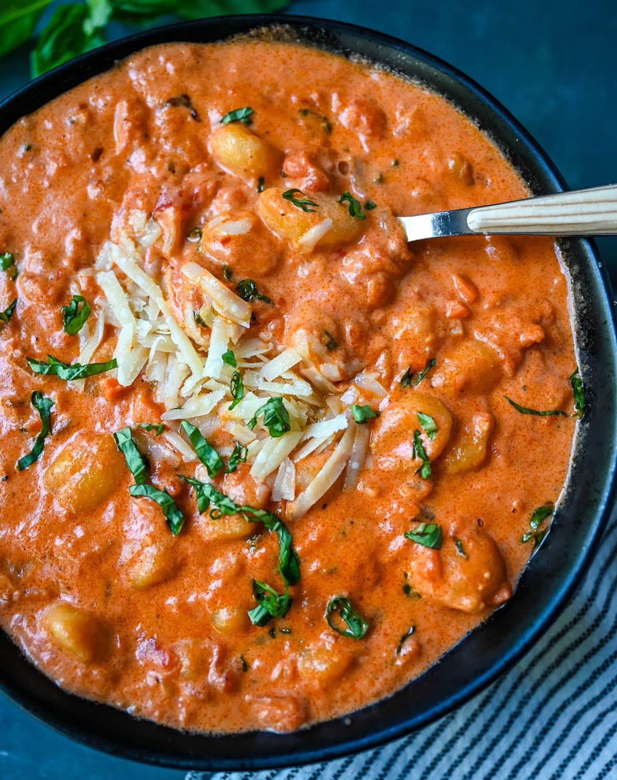This easy Gnocchi alla Vodka combines soft, tender gnocchi with a silky, tomato-cream vodka sauce that’s bursting with garlic, parmesan, and fresh basil. This Gnocchi with Tomato Cream Sauce is an easy weeknight dinner but it tastes like it is straight out of an Italian restaurant.