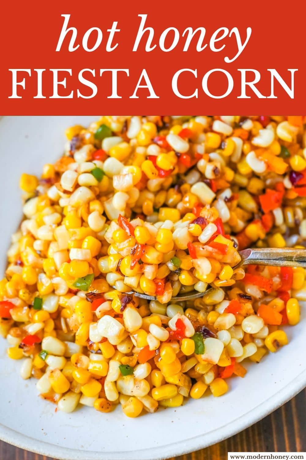 This Hot Honey Skillet Corn recipe is an easy and flavorful side dish made with sweet corn, peppers, onions, and spicy hot honey. It’s a quick corn recipe that's ready in under 20 minutes and pairs perfectly with roasted turkey or chicken.