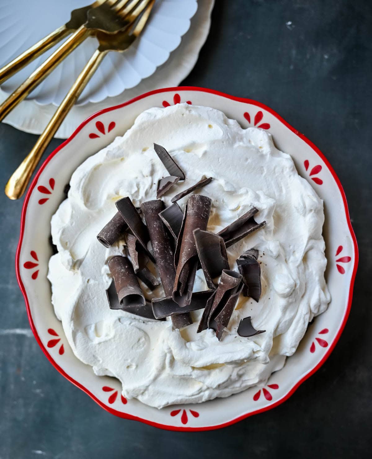 This No Bake Chocolate Cream Pie is made with a buttery Oreo crust holding a luscious chocolate ganache filling topped with sweetened whipped cream. Made with just a handful of ingredients, it’s creamy, chocolatey, and totally foolproof. An easy Chocolate Cream Pie recipe!