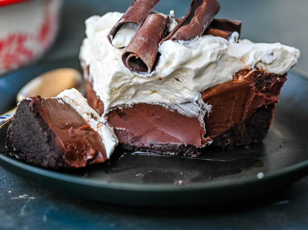 This No Bake Chocolate Cream Pie is made with a buttery Oreo crust holding a luscious chocolate ganache filling topped with sweetened whipped cream. Made with just a handful of ingredients, it’s creamy, chocolatey, and totally foolproof. An easy Chocolate Cream Pie recipe!