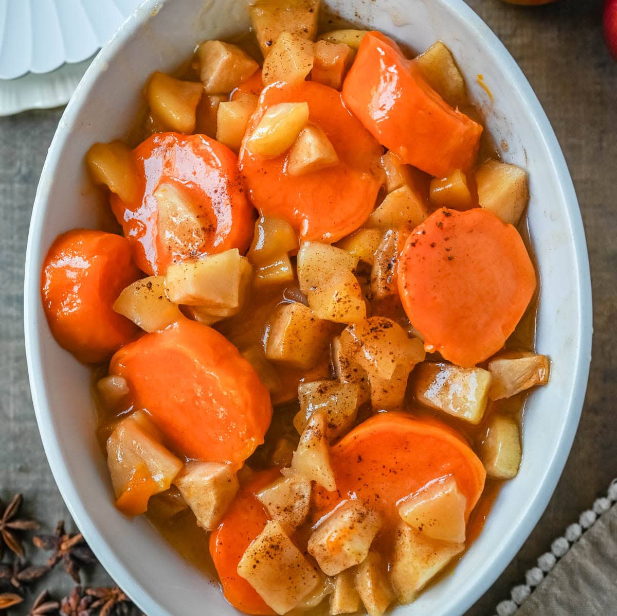 This Sweet Potatoes and Apples Recipe is mad with tender sweet potatoes and apples layered in a silky golden butter and sugar sauce that thickens into a glaze as it bakes. A timeless fall side dish everyone will love.