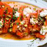 These Sweet and Spicy Roasted Carrots are the perfect combination of sweetness and a warm kick from the Calabrian chili paste. Topped with creamy burrata, crunchy pistachios, and fresh basil, this side dish feels restaurant-worthy but is incredibly easy to make at home. The best roasted carrot side dish recipe!