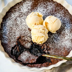 Brownie pudding is the viral, ultra-rich chocolate dessert combining the best parts of brownies and molten lava cake. This easy dessert bakes into a crackly top with a gooey, fudgy, pudding-like center that is chocolate lover's dream dessert. Made famous by Ina Garten, brownie pudding is trending everywhere on TikTok, thanks to its simple ingredients, decadent texture, and rich flavor. You will love Ina Garten's Brownie Pudding recipe!