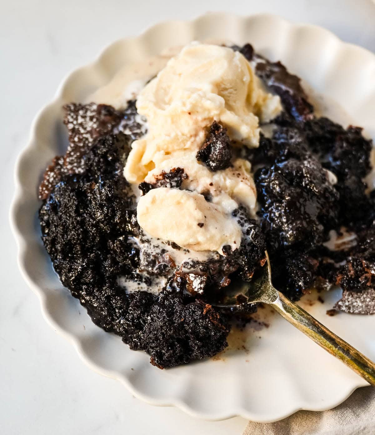 Brownie pudding is the viral, ultra-rich chocolate dessert combining the best parts of brownies and molten lava cake. This easy dessert bakes into a crackly top with a gooey, fudgy, pudding-like center that is chocolate lover's dream dessert. Made famous by Ina Garten, brownie pudding is trending everywhere on TikTok, thanks to its simple ingredients, decadent texture, and rich flavor. You will love Ina Garten's Brownie Pudding recipe!