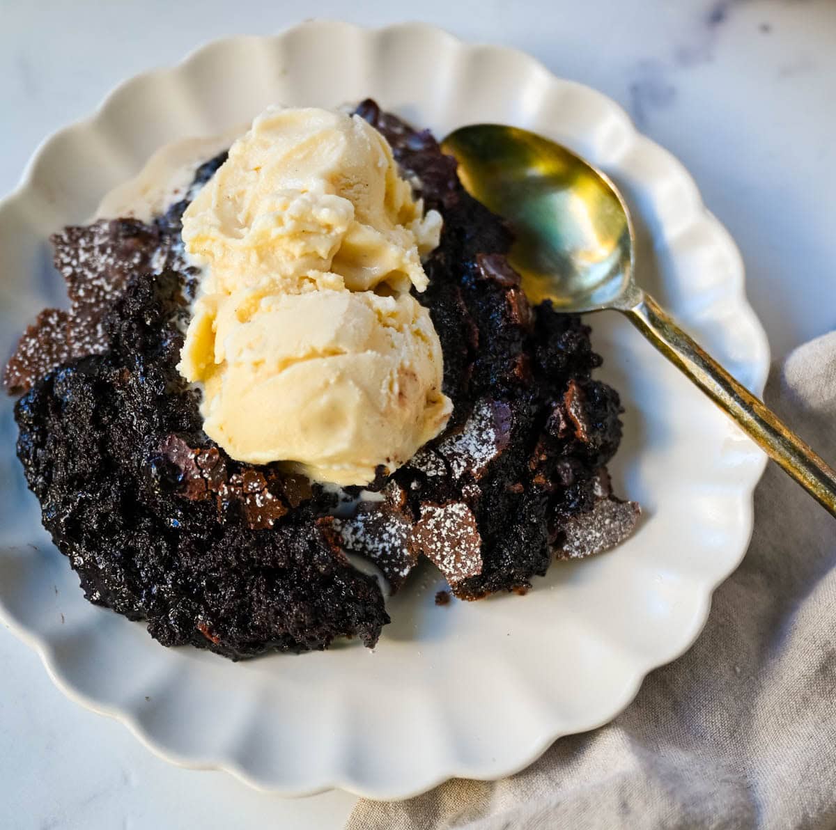 Brownie pudding is the viral, ultra-rich chocolate dessert combining the best parts of brownies and molten lava cake. This easy dessert bakes into a crackly top with a gooey, fudgy, pudding-like center that is chocolate lover's dream dessert. Made famous by Ina Garten, brownie pudding is trending everywhere on TikTok, thanks to its simple ingredients, decadent texture, and rich flavor. You will love Ina Garten's Brownie Pudding recipe!