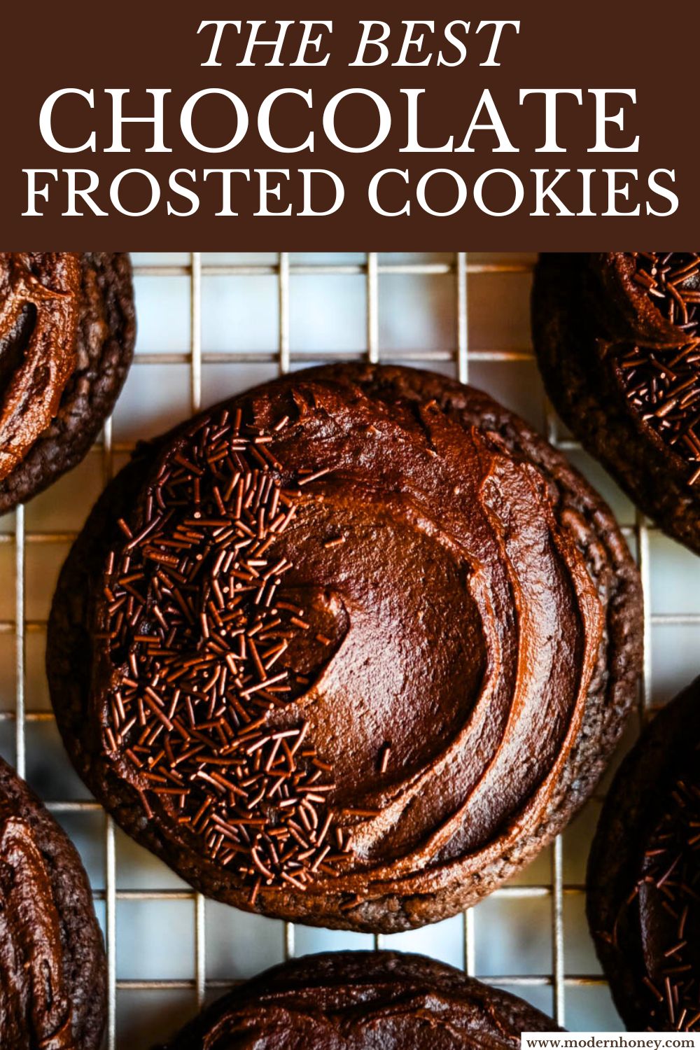 These easy Chocolate Frosted Cookies combine soft chocolate cookies with a rich, chocolate buttercream frosting. The double chocolate cookie base is filled with melty chocolate chips and a smooth cocoa frosting on top. These Frosted Chocolate Cookies are a chocolate lover’s dream.