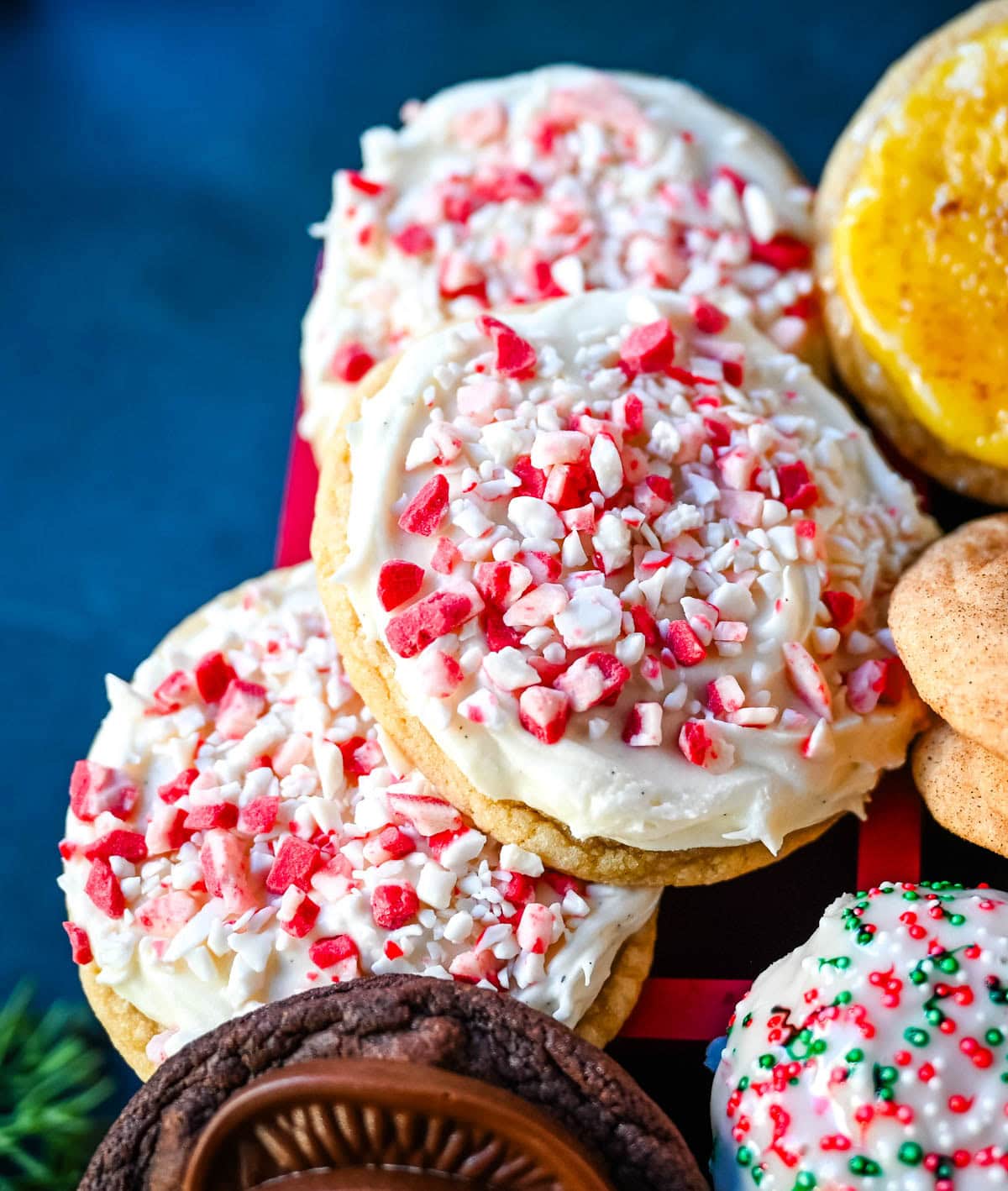 These Peppermint Frosted Sugar Cookies are soft, chewy, and topped with the creamiest peppermint cream cheese frosting. If you love peppermint desserts or are looking for a crowd-favorite holiday cookie, this peppermint cookie recipe is always a hit.
