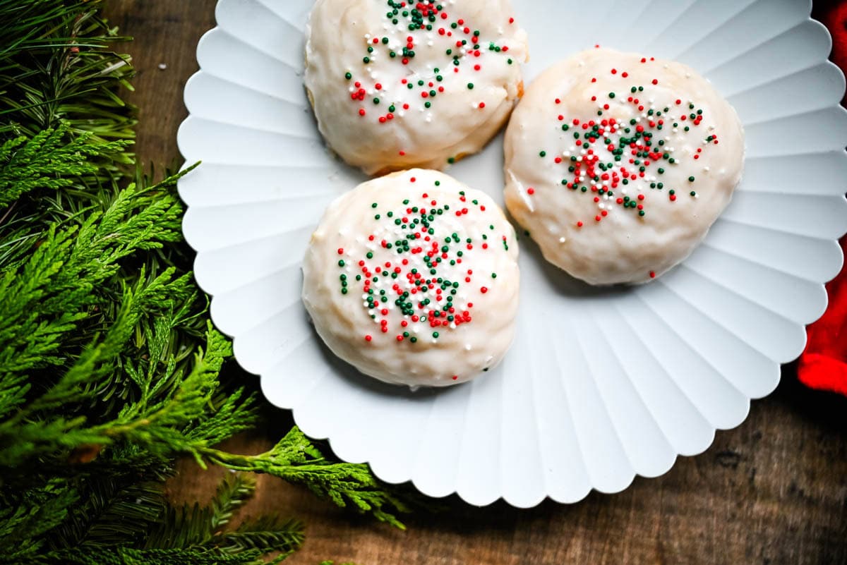 Italian ricotta cookies are one of the most popular Italian Christmas cookies, loved for their melt-in-your-mouth, soft texture. These holiday cookies are topped with a sweet glaze and colorful sprinkles, making them a perfect addition to any Christmas cookie platter. Ricotta cookies capture the flavor of classic Italian holiday baking. Whether you’re hosting a Christmas party or sharing homemade gifts, these easy Christmas cookies are guaranteed to stand out on every dessert table.