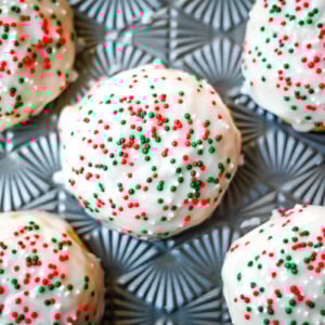 Italian ricotta cookies are one of the most popular Italian Christmas cookies, loved for their melt-in-your-mouth, soft texture. These holiday cookies are topped with a sweet glaze and colorful sprinkles, making them a perfect addition to any Christmas cookie platter. Ricotta cookies capture the flavor of classic Italian holiday baking. Whether you’re hosting a Christmas party or sharing homemade gifts, these easy Christmas cookies are guaranteed to stand out on every dessert table.