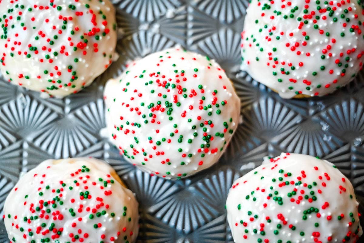 Italian ricotta cookies are one of the most popular Italian Christmas cookies, loved for their melt-in-your-mouth, soft texture. These holiday cookies are topped with a sweet glaze and colorful sprinkles, making them a perfect addition to any Christmas cookie platter. Ricotta cookies capture the flavor of classic Italian holiday baking. Whether you’re hosting a Christmas party or sharing homemade gifts, these easy Christmas cookies are guaranteed to stand out on every dessert table.