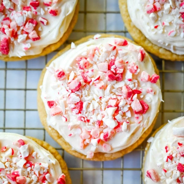 These Peppermint Frosted Sugar Cookies are soft, chewy, and topped with the creamiest peppermint cream cheese frosting. If you love peppermint desserts or are looking for a crowd-favorite holiday cookie, this peppermint cookie recipe is always a hit.