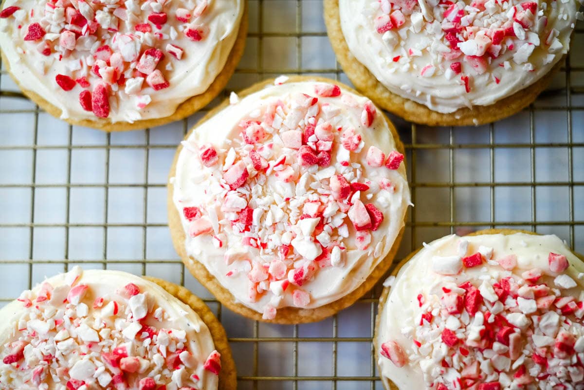 These Peppermint Frosted Sugar Cookies are soft, chewy, and topped with the creamiest peppermint cream cheese frosting. If you love peppermint desserts or are looking for a crowd-favorite holiday cookie, this peppermint cookie recipe is always a hit.