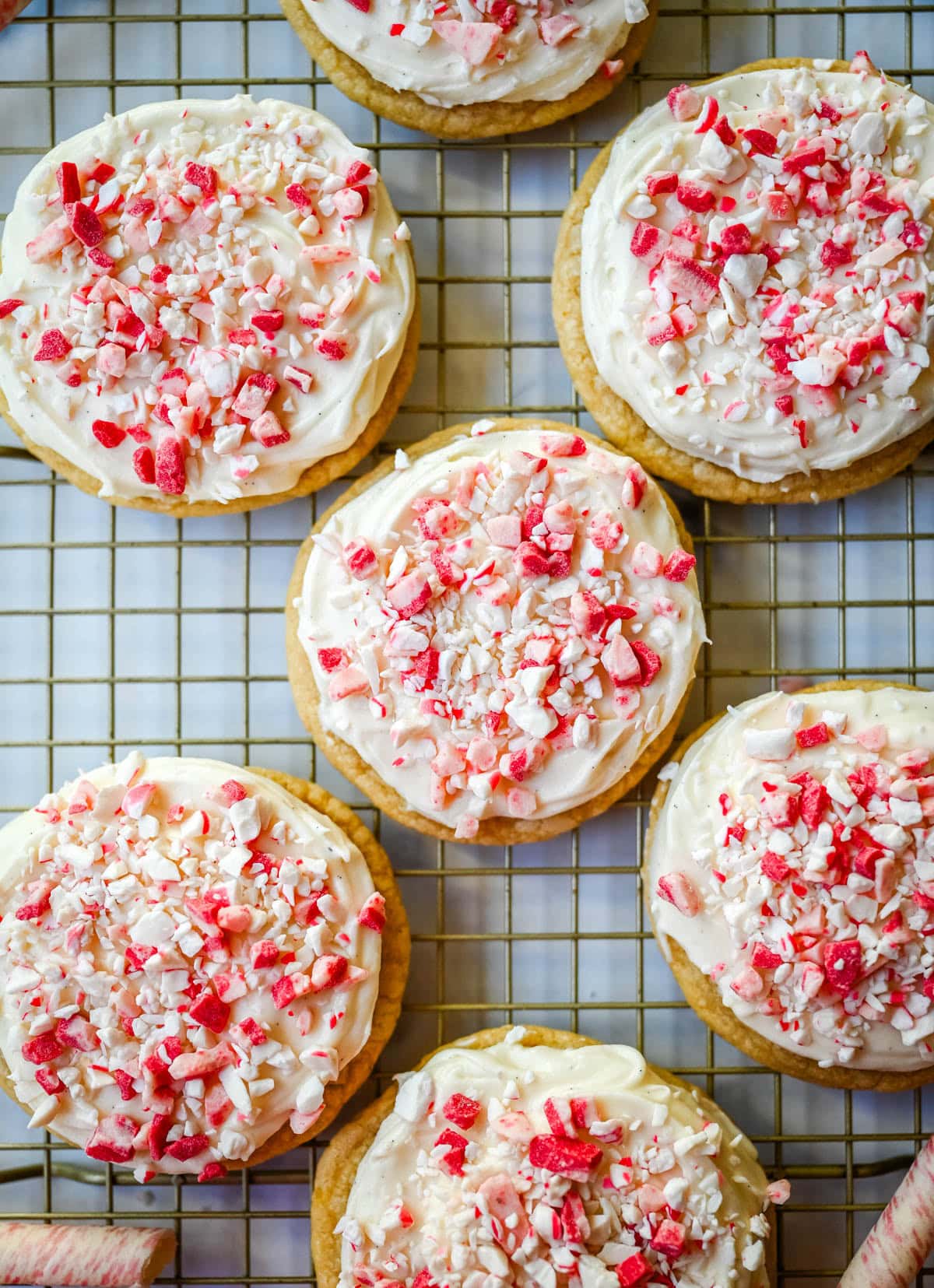 These Peppermint Frosted Sugar Cookies are soft, chewy, and topped with the creamiest peppermint cream cheese frosting. If you love peppermint desserts or are looking for a crowd-favorite holiday cookie, this peppermint cookie recipe is always a hit.