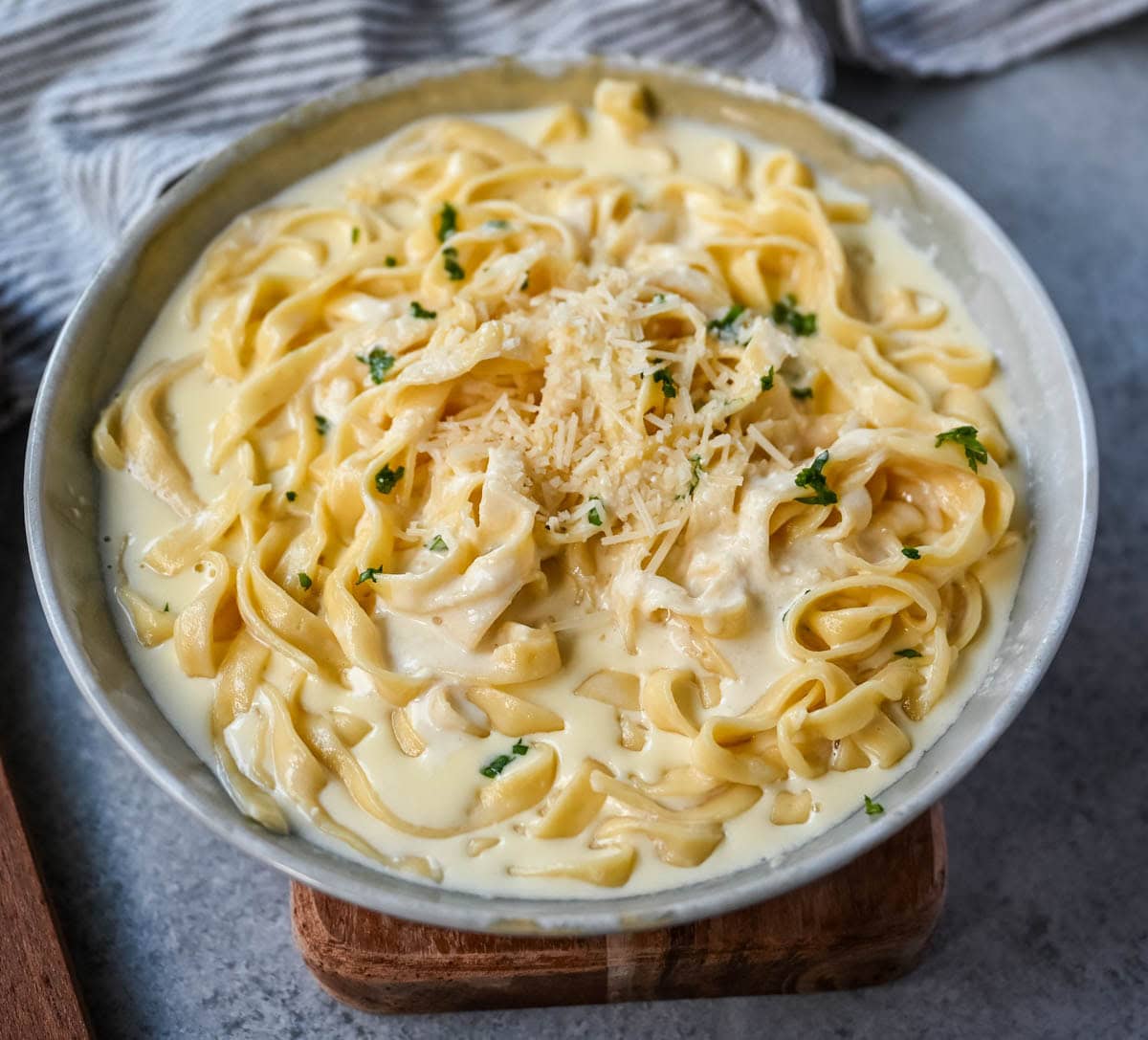 This is the best Alfredo sauce recipe that's rich, creamy, and made completely from scratch with butter, heavy cream, garlic, and freshly grated parmesan. This classic homemade Alfredo sauce comes together in under 20 minutes and is way better than anything in a jar.