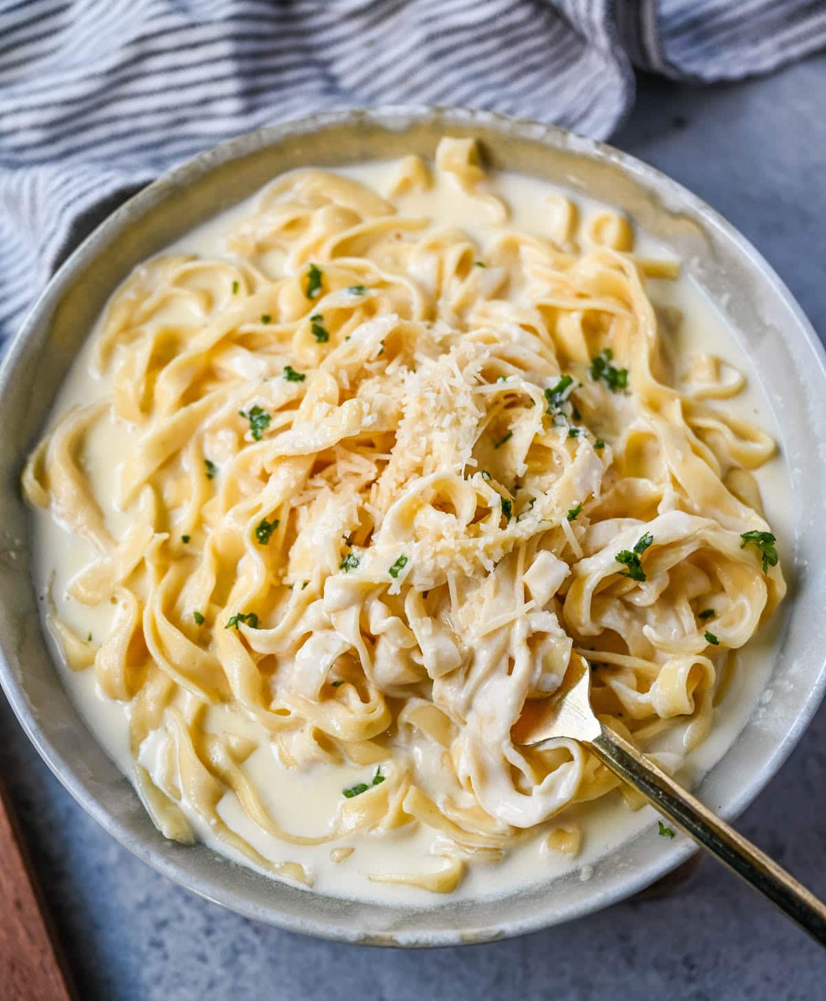 This is the best Alfredo sauce recipe that's rich, creamy, and made completely from scratch with butter, heavy cream, garlic, and freshly grated parmesan. This classic homemade Alfredo sauce comes together in under 20 minutes and is way better than anything in a jar.