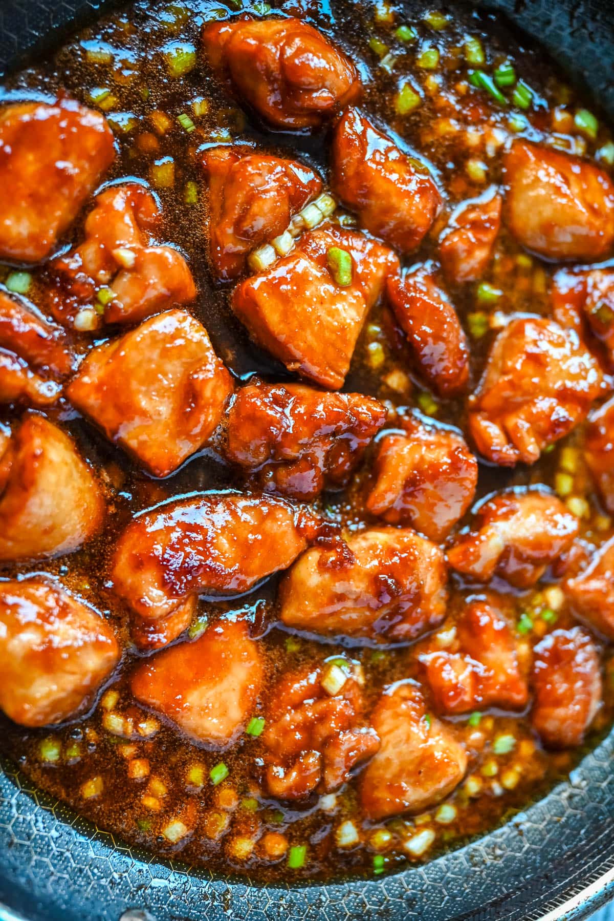This sticky honey gochujang chicken is a quick and easy 30-minute dinner recipe with Korean-inspired flavor. Juicy chicken breast is coated in a sweet, spicy glaze made with honey, garlic, soy sauce, and gochujang paste for a perfect melt-in-your-mouth texture. Serve it over coconut rice or noodles for a simple easy dinner recipe!