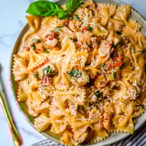 This Marry Me Chicken Pasta recipe features chicken, sun-dried tomatoes, heavy cream, parmesan cheese, and pasta in a rich, flavorful sauce. It’s a simple one-pan creamy chicken pasta that’s an easy dinner recipe!
