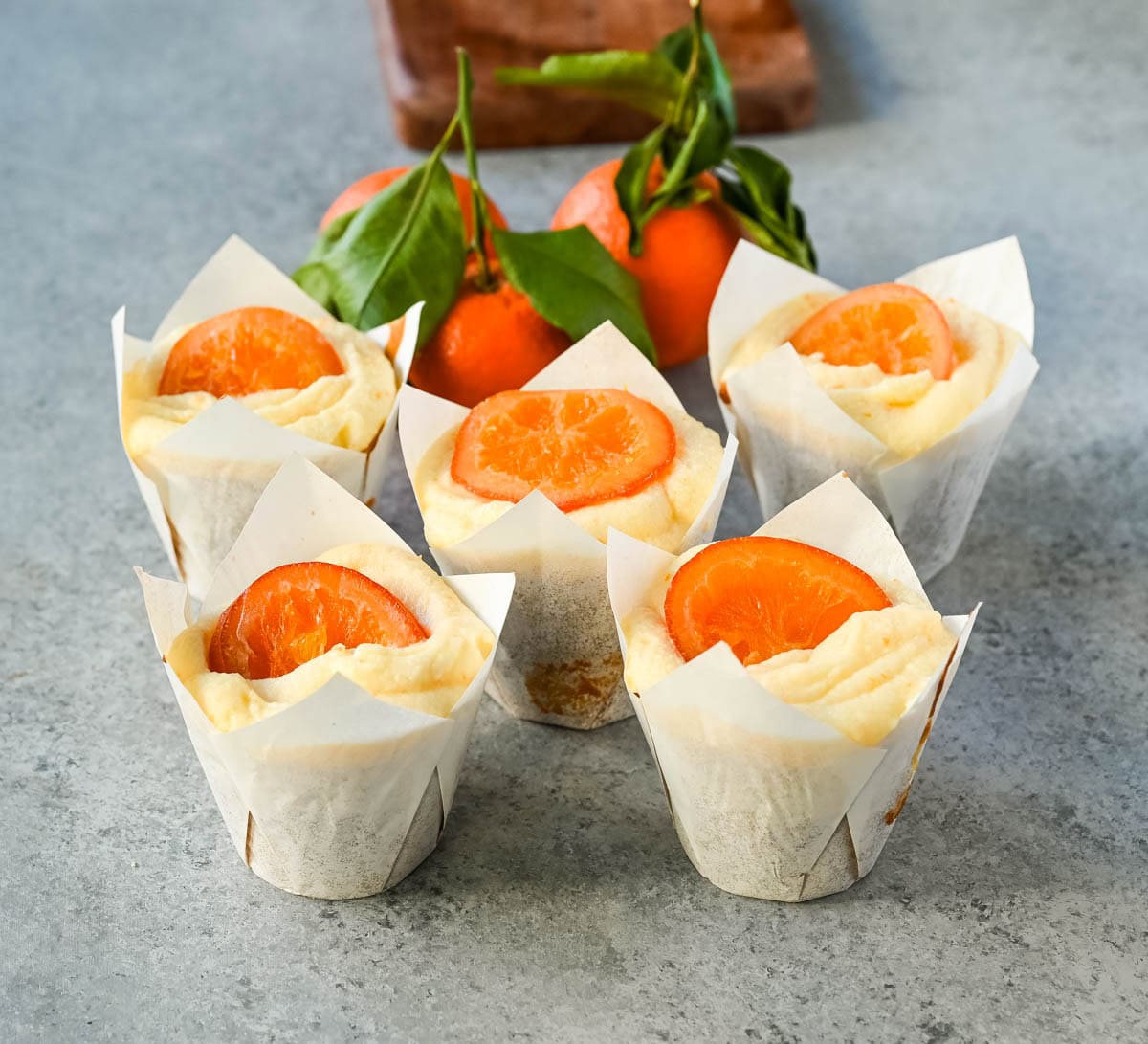 These moist orange olive oil cupcakes made with olive oil are light, tender, and bursting with fresh orange flavor. Sour cream adds richness while olive oil ensures a soft crumb. Finished with orange cream cheese frosting, these are the best orange cupcake recipe.