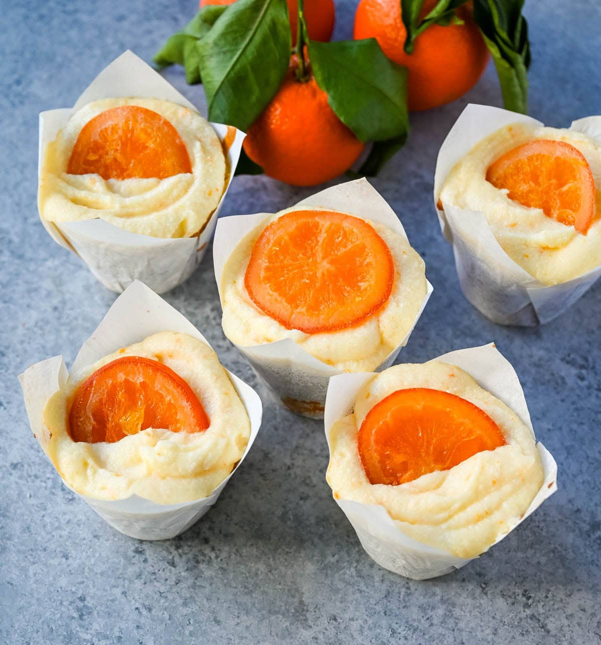 These moist orange olive oil cupcakes made with olive oil are light, tender, and bursting with fresh orange flavor. Sour cream adds richness while olive oil ensures a soft crumb. Finished with orange cream cheese frosting, these are the best orange cupcake recipe.
