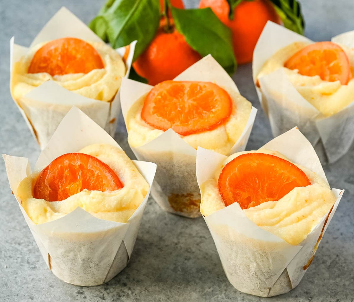 These moist orange olive oil cupcakes made with olive oil are light, tender, and bursting with fresh orange flavor. Sour cream adds richness while olive oil ensures a soft crumb. Finished with orange cream cheese frosting, these are the best orange cupcake recipe.