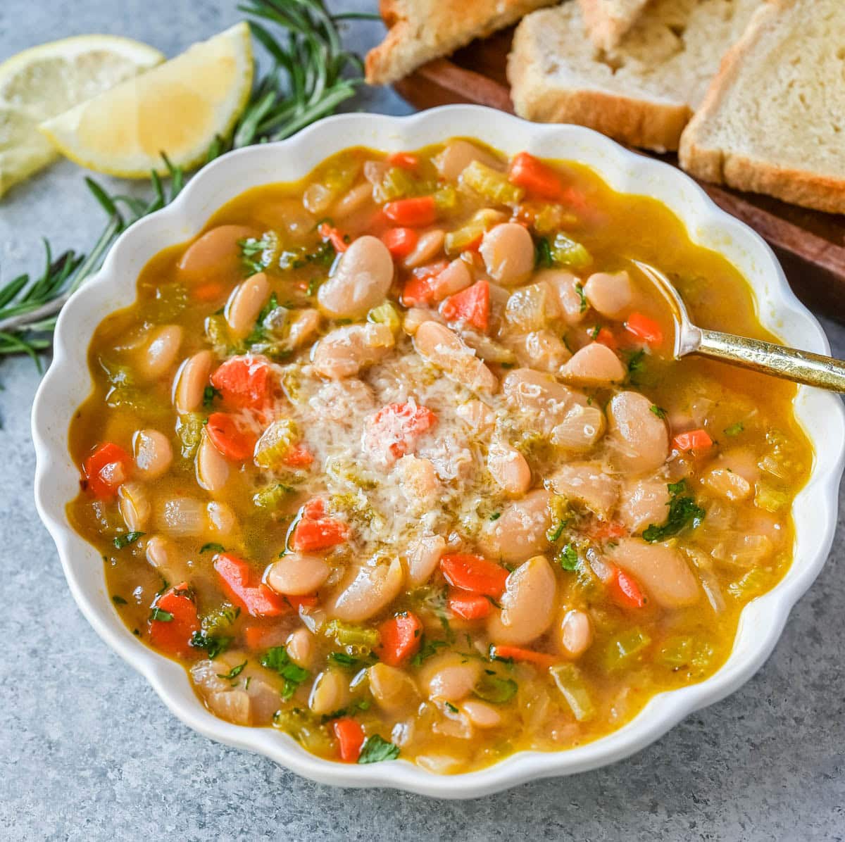 Tuscan White Bean Soup is a hearty Italian soup made with white beans, vegetables, garlic, herbs, and savory broth. It’s simple to make, incredibly comforting, and packed with protein and fiber. You will love this healthy white bean soup recipe!