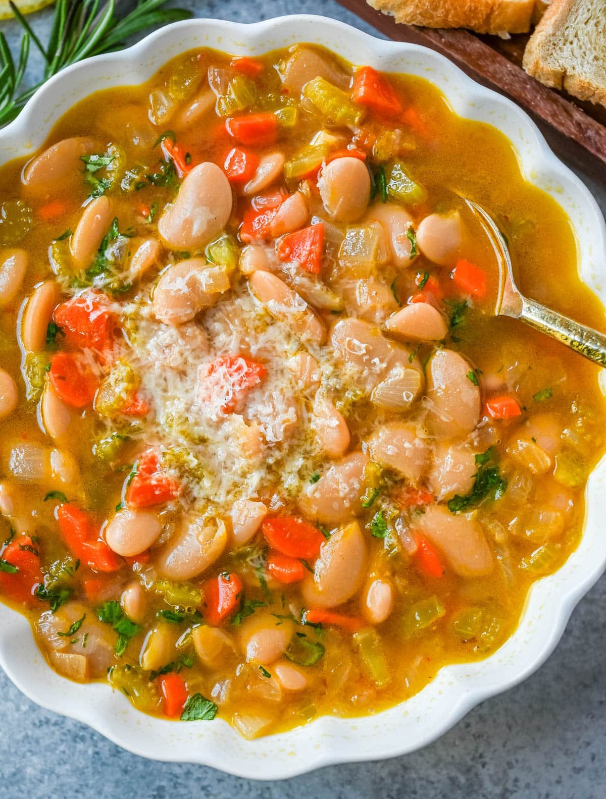 Tuscan White Bean Soup is a hearty Italian soup made with white beans, vegetables, garlic, herbs, and savory broth. It’s simple to make, incredibly comforting, and packed with protein and fiber. You will love this healthy white bean soup recipe!