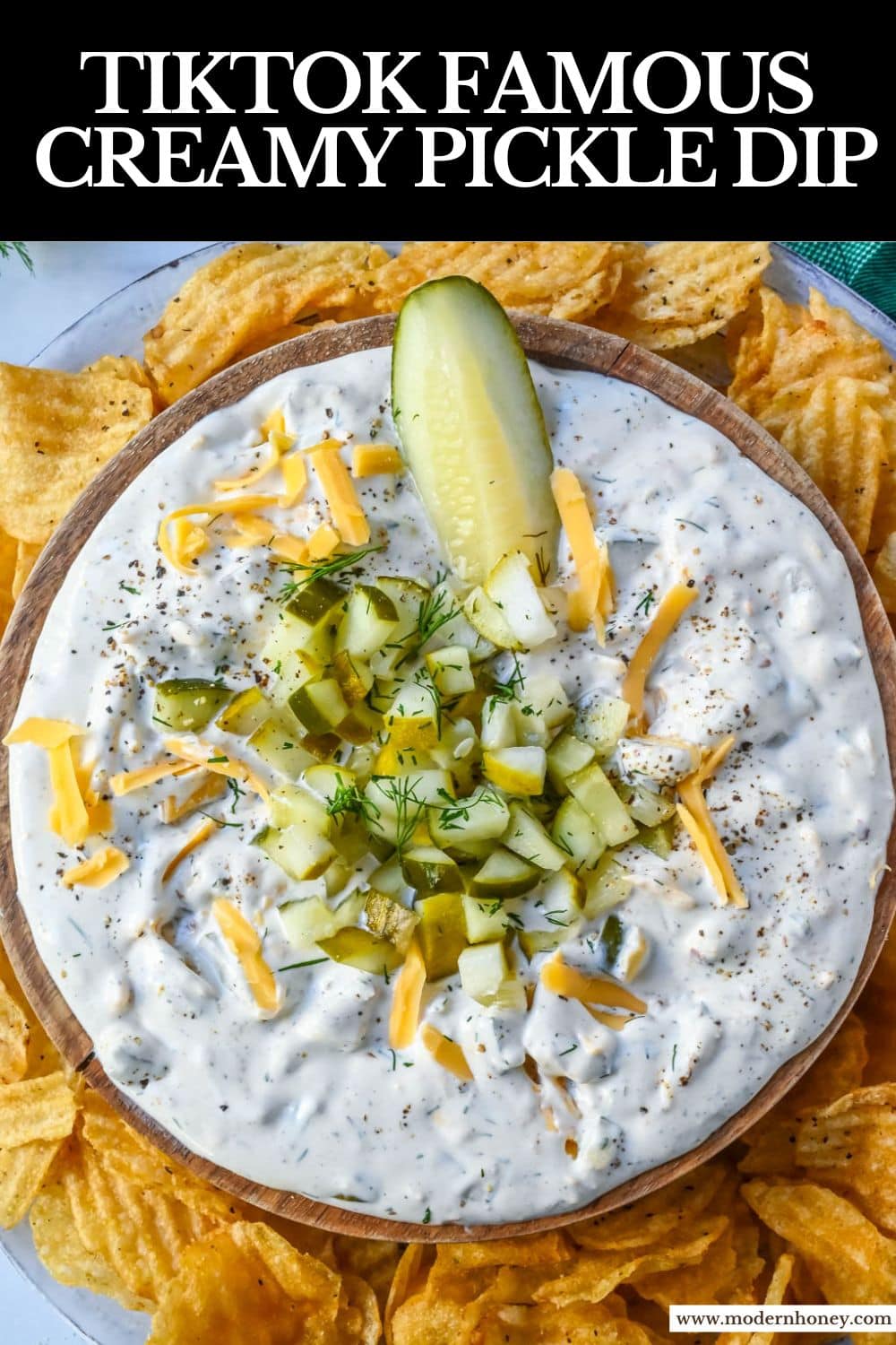 This Dill Pickle Dip is creamy, tangy, and the ultimate party dip for pickle lovers! Made with Greek yogurt, cream cheese, and sour cream for the perfect balance of creamy and zesty, it’s loaded with chopped dill pickles, fresh dill, sharp cheddar, and a touch of spice!