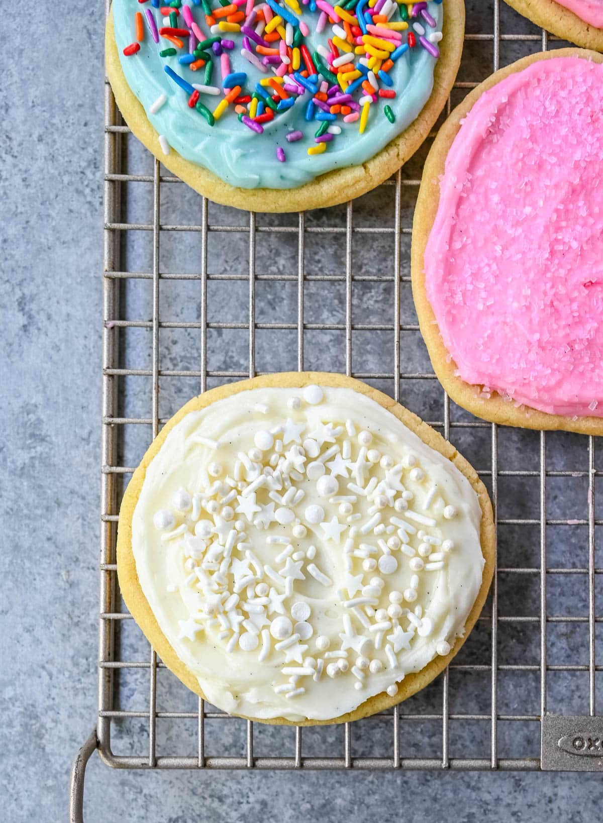 If you are looking for the best soft sugar cookies with frosting, this is the recipe you’ll come back to again and again. These frosted sugar cookies topped with cream cheese frosting bake up perfectly tender and stay soft for days.