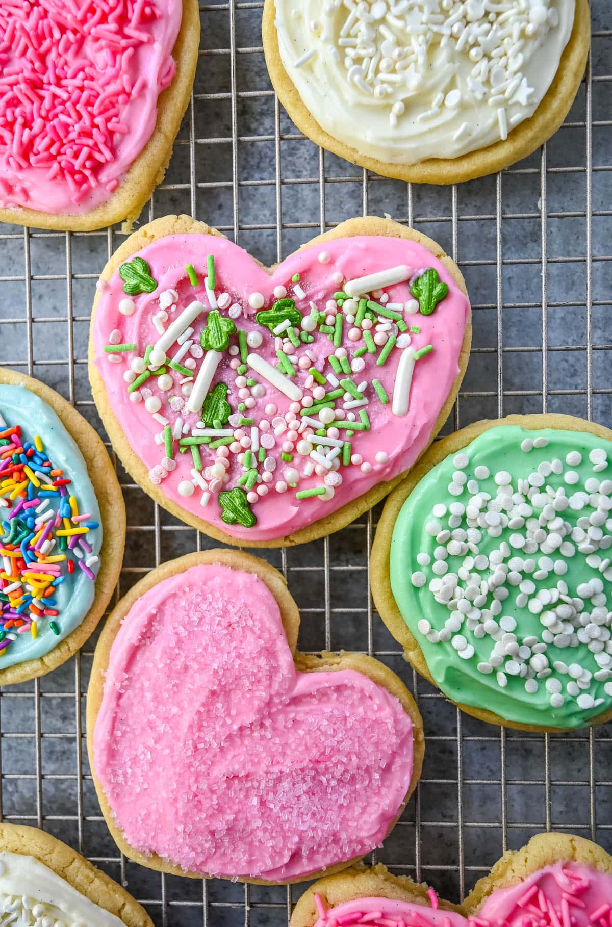 If you are looking for the best soft sugar cookies with frosting, this is the recipe you’ll come back to again and again. These frosted sugar cookies topped with cream cheese frosting bake up perfectly tender and stay soft for days.