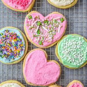 If you are looking for the best soft sugar cookies with frosting, this is the recipe you’ll come back to again and again. These frosted sugar cookies topped with cream cheese frosting bake up perfectly tender and stay soft for days.