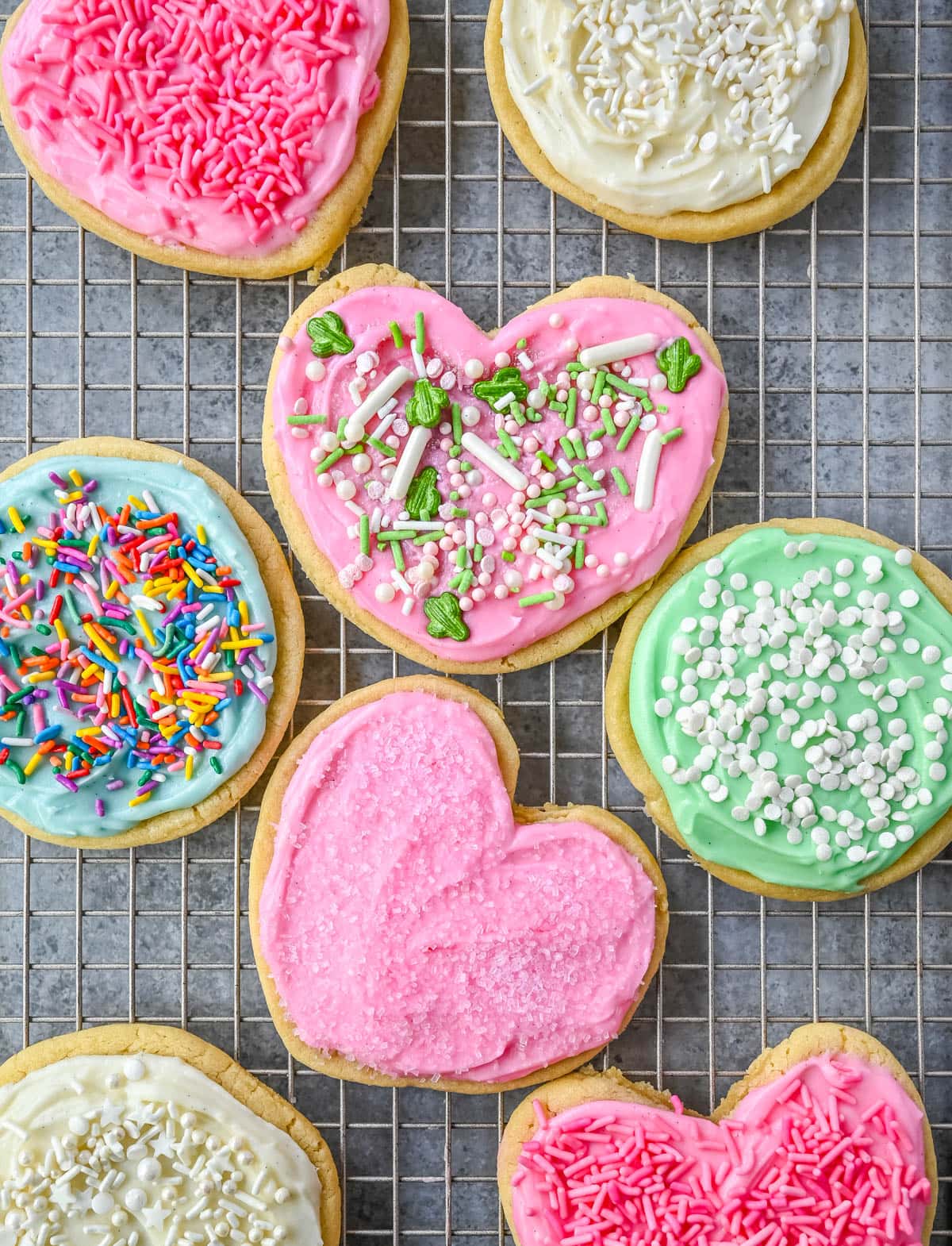 If you are looking for the best soft sugar cookies with frosting, this is the recipe you’ll come back to again and again. These frosted sugar cookies topped with cream cheese frosting bake up perfectly tender and stay soft for days.