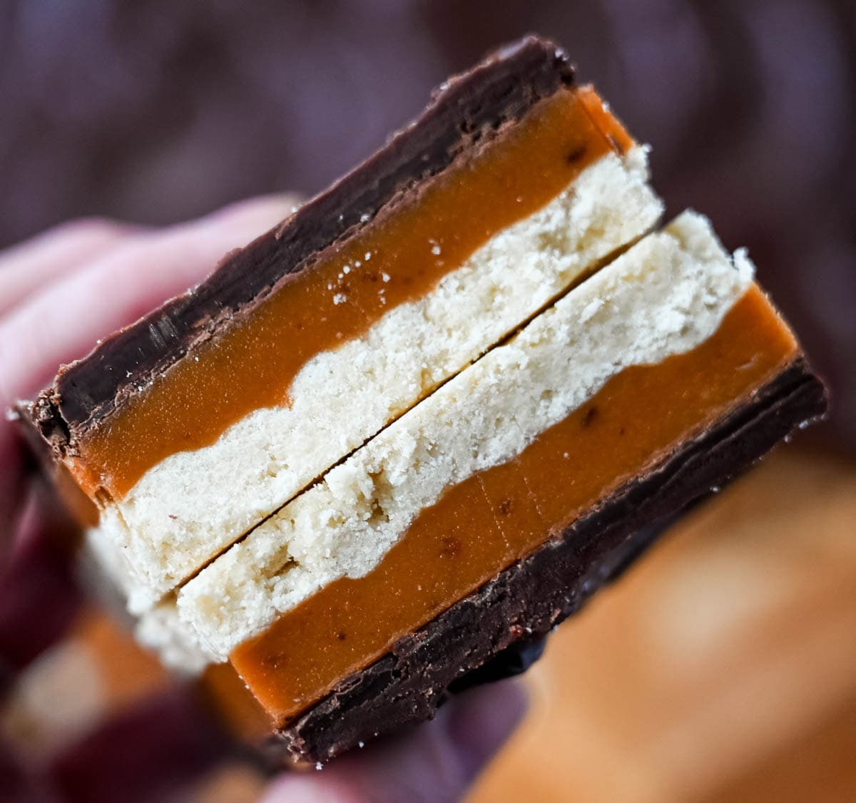 These classic, rich millionaire bars feature a buttery shortbread crust, a thick layer of smooth caramel, and a rich chocolate ganache. An easy dessert bar recipe that everyone loves!