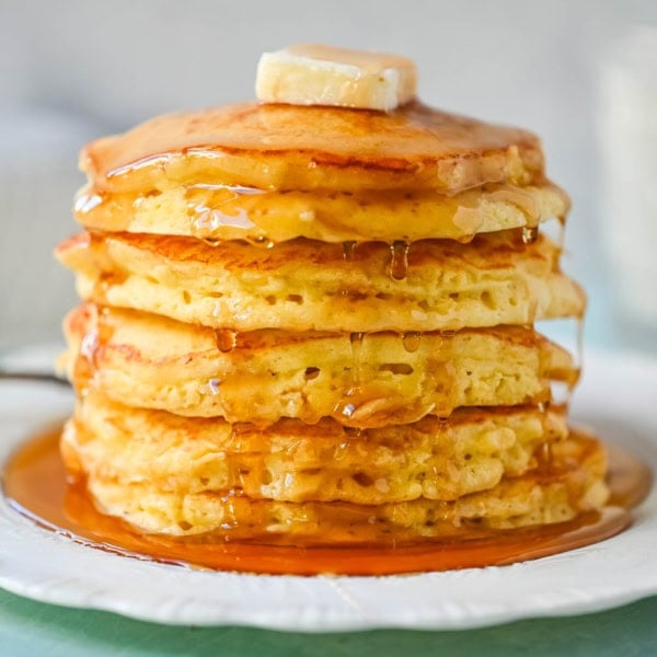 Best Fluffy Pancake Recipe. This is the best pancake recipe from scratch because it uses both whipped egg whites and baking powder, along with rich buttermilk and creamy ricotta, to create incredibly fluffy, light pancakes with a soft, tender interior. The buttermilk adds a subtle tang and helps keep the pancakes moist, while the ricotta brings a rich and creamy texture. The method is simple but effective, giving you consistent results without complicated steps. The combination of these ingredients creates perfect homemade pancakes every time.