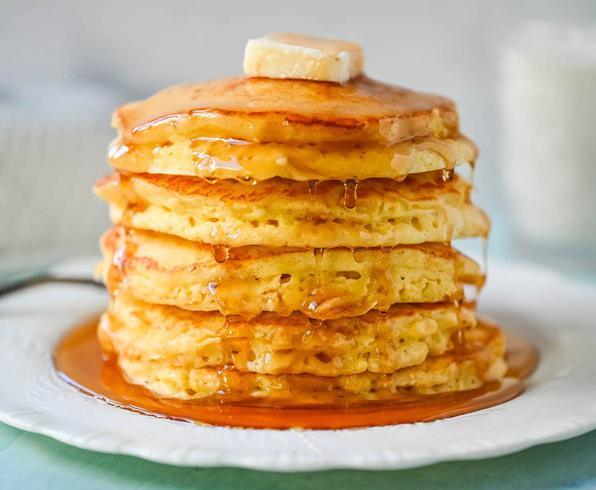 Best Fluffy Pancake Recipe. This is the best pancake recipe from scratch because it uses both whipped egg whites and baking powder, along with rich buttermilk and creamy ricotta, to create incredibly fluffy, light pancakes with a soft, tender interior. The buttermilk adds a subtle tang and helps keep the pancakes moist, while the ricotta brings a rich and creamy texture. The method is simple but effective, giving you consistent results without complicated steps. The combination of these ingredients creates perfect homemade pancakes every time.