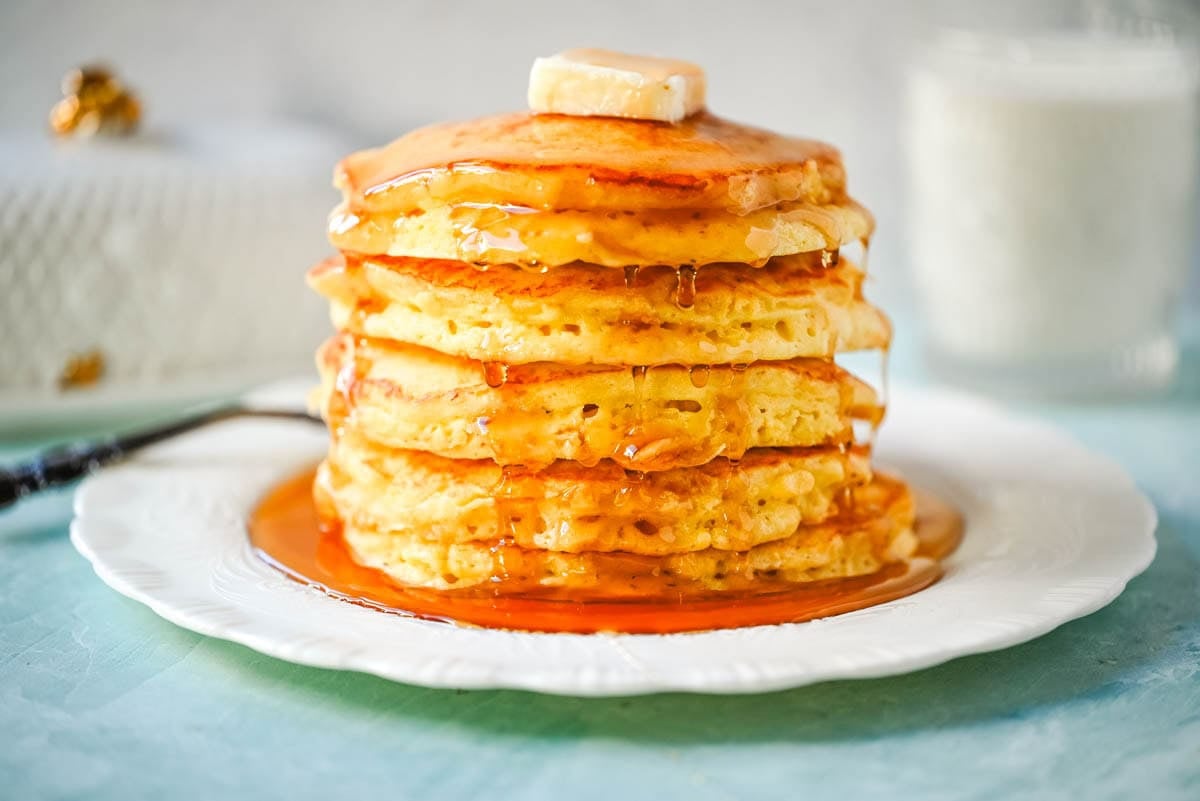 Best Fluffy Pancake Recipe. This is the best pancake recipe from scratch because it uses both whipped egg whites and baking powder, along with rich buttermilk and creamy ricotta, to create incredibly fluffy, light pancakes with a soft, tender interior. The buttermilk adds a subtle tang and helps keep the pancakes moist, while the ricotta brings a rich and creamy texture. The method is simple but effective, giving you consistent results without complicated steps. The combination of these ingredients creates perfect homemade pancakes every time.