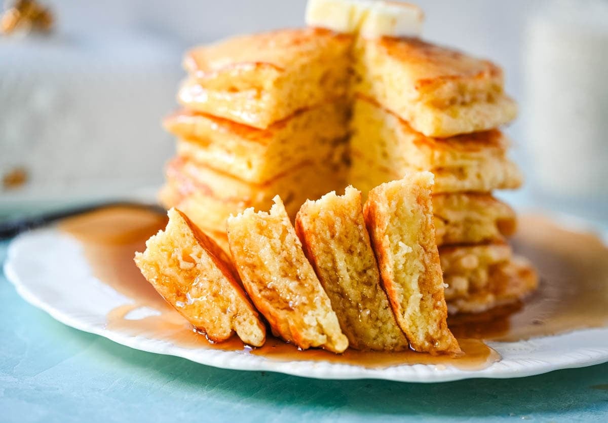 Best Fluffy Pancake Recipe. This is the best pancake recipe from scratch because it uses both whipped egg whites and baking powder, along with rich buttermilk and creamy ricotta, to create incredibly fluffy, light pancakes with a soft, tender interior. The buttermilk adds a subtle tang and helps keep the pancakes moist, while the ricotta brings a rich and creamy texture. The method is simple but effective, giving you consistent results without complicated steps. The combination of these ingredients creates perfect homemade pancakes every time.