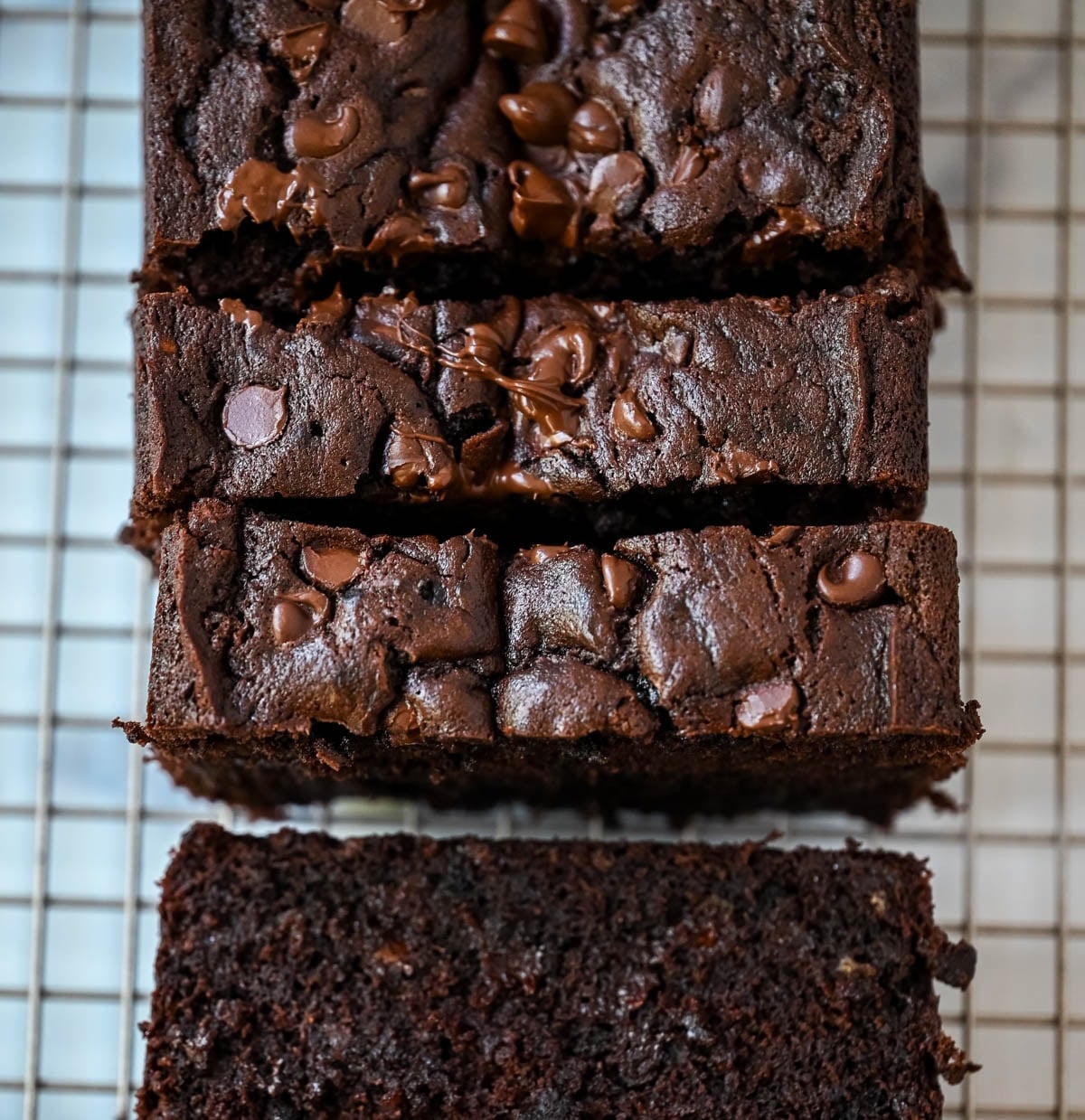 This easy double chocolate banana bread is rich, moist, and full of chocolate chips—the perfect chocolate banana bread recipe for using overripe bananas.