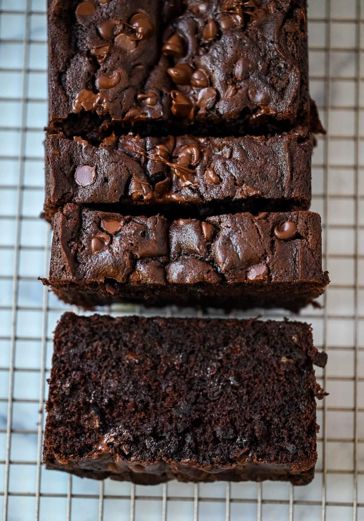 This easy double chocolate banana bread is rich, moist, and full of chocolate chips—the perfect chocolate banana bread recipe for using overripe bananas.