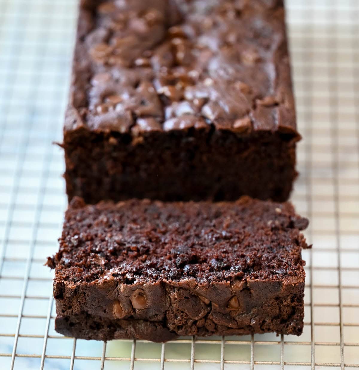 This easy double chocolate banana bread is rich, moist, and full of chocolate chips—the perfect chocolate banana bread recipe for using overripe bananas.