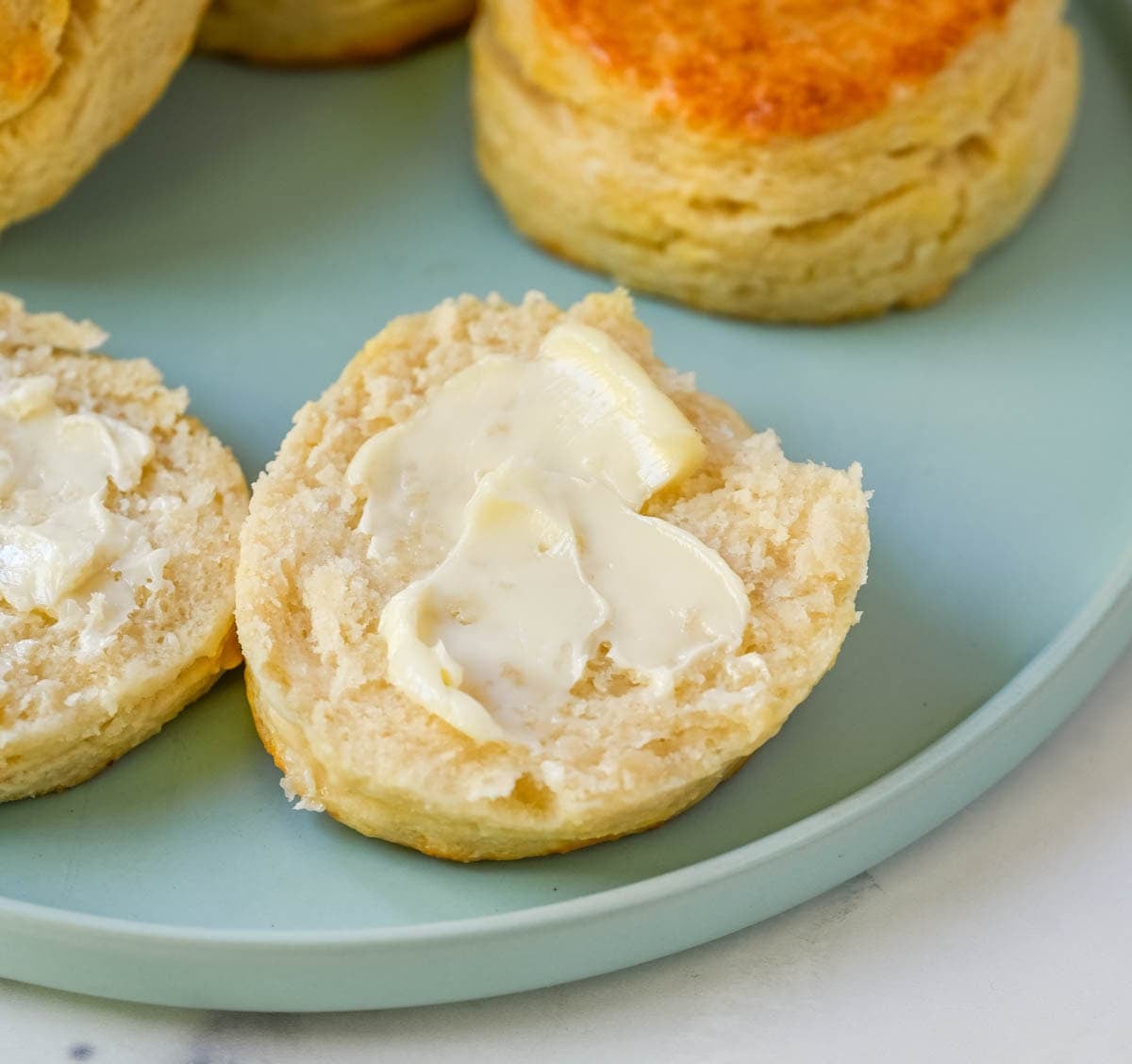 These classic buttermilk biscuits are soft, flaky, and rich with buttery flavor. Each biscuit rises tall in the oven, creating delicate layers with a crisp, golden exterior and a tender, airy interior. This easy biscuit recipe uses 6 simple ingredients and has the perfect texture without complicated steps. It’s a classic homemade biscuit recipe that everyone loves.