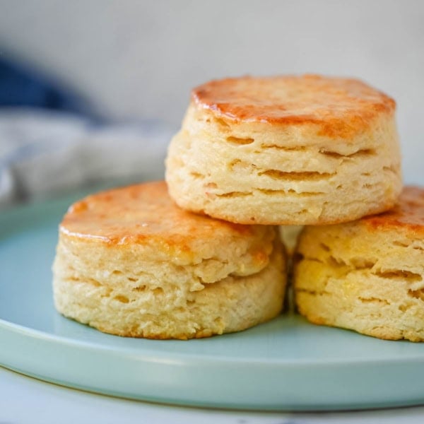 These classic buttermilk biscuits are soft, flaky, and rich with buttery flavor. Each biscuit rises tall in the oven, creating delicate layers with a crisp, golden exterior and a tender, airy interior. This easy biscuit recipe uses 6 simple ingredients and has the perfect texture without complicated steps. It’s a classic homemade biscuit recipe that everyone loves.