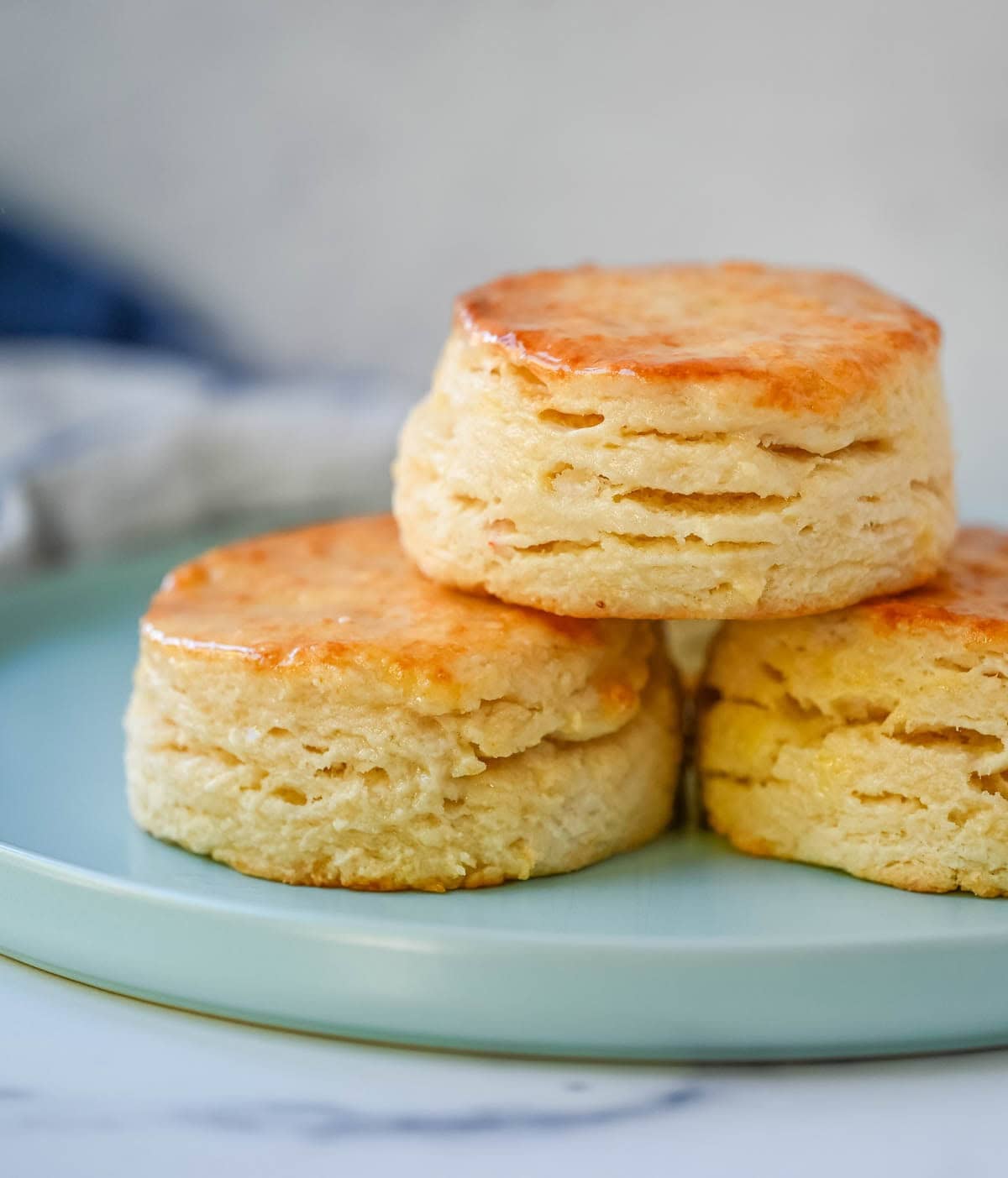 These classic buttermilk biscuits are soft, flaky, and rich with buttery flavor. Each biscuit rises tall in the oven, creating delicate layers with a crisp, golden exterior and a tender, airy interior. This easy biscuit recipe uses 6 simple ingredients and has the perfect texture without complicated steps. It’s a classic homemade biscuit recipe that everyone loves.