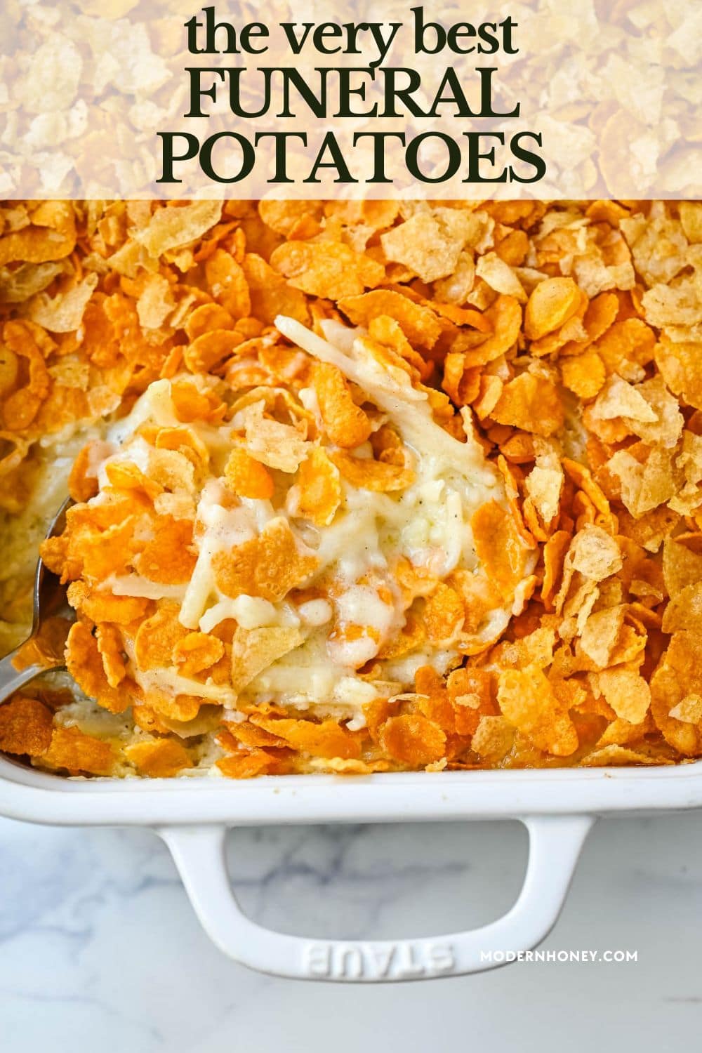This creamy, cheesy funeral potatoes recipe is the ultimate comfort food casserole made with hash browns, sour cream, cheddar, and a rich homemade sauce. Topped with a crispy cornflake and potato chip crust, it’s perfect for Easter, potlucks, and family dinners. Learn how to make the best funeral potatoes from scratch -- no canned soup needed.