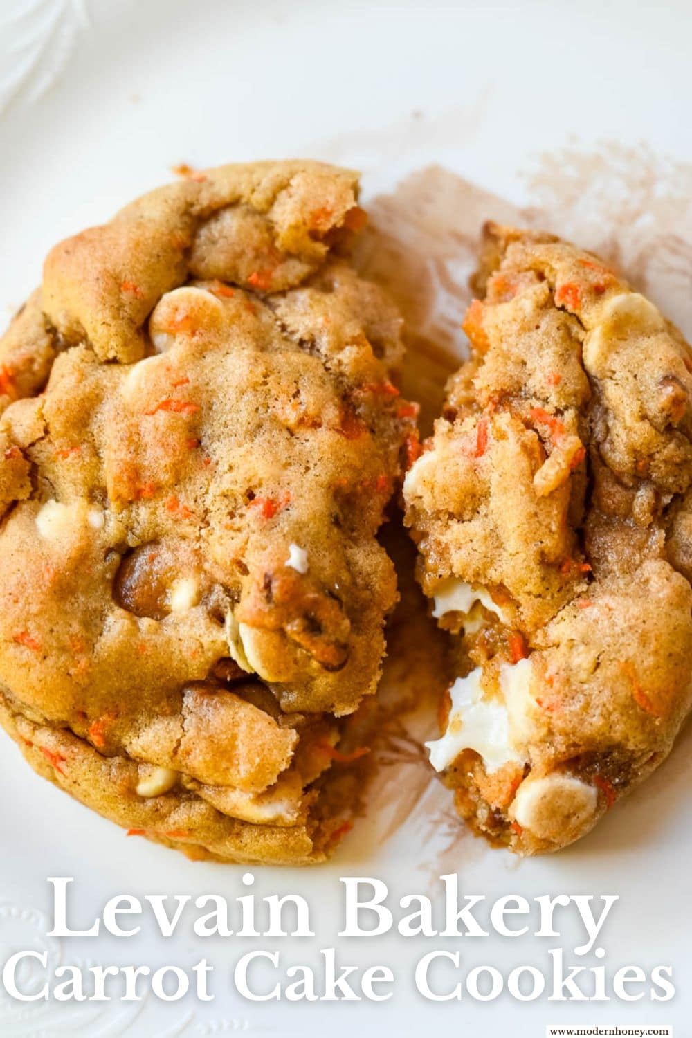 These Levain Bakery Carrot Cake Cookies are everything you love about carrot cake in a soft, thick cookie. Made with shredded carrots, warm spices, white chocolate chips, dried apricots and pecans, they are rich, flavorful, and perfectly chewy. A delicious spring dessert that’s easy to make at home!