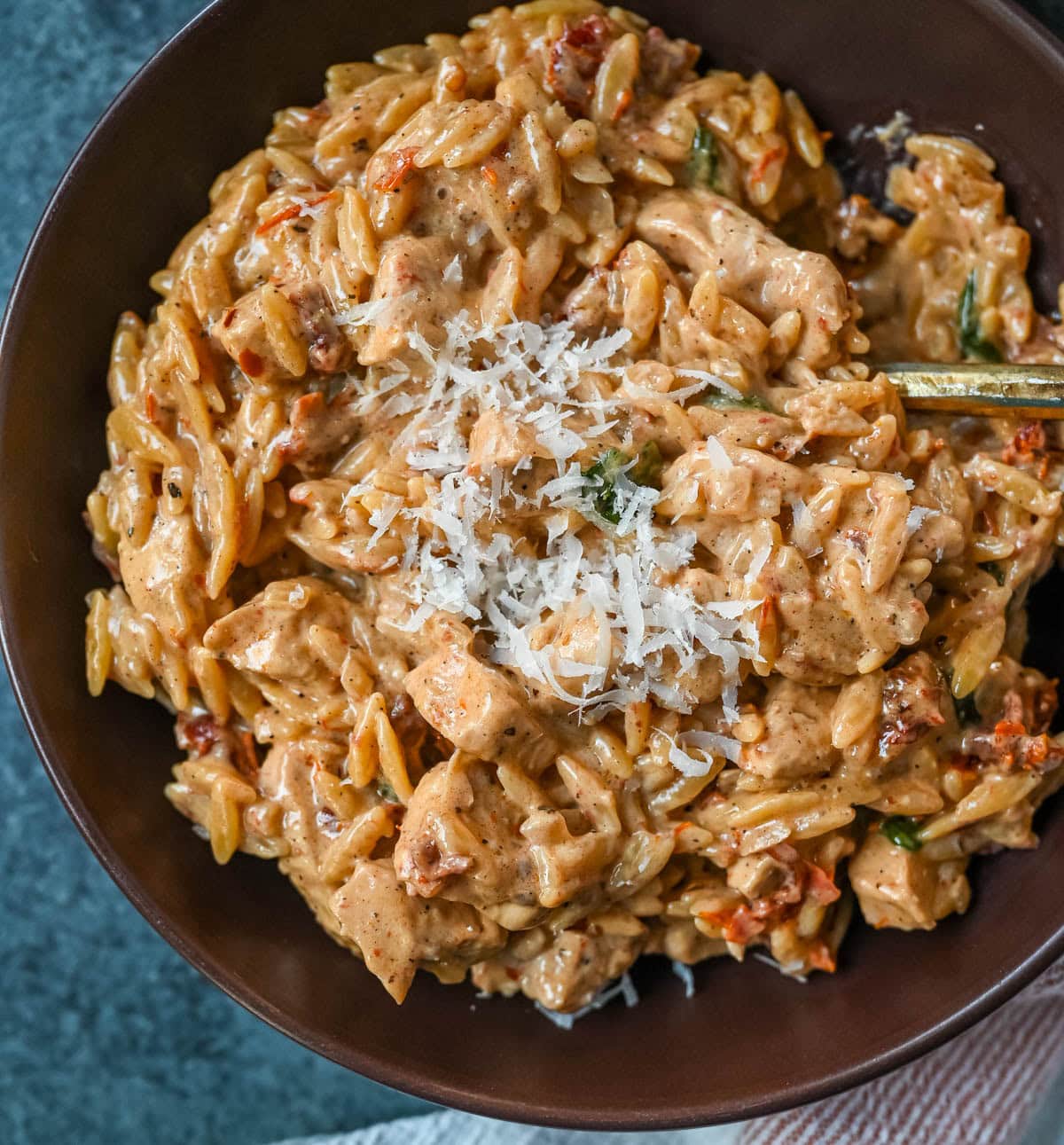 This Marry Me Chicken Orzo is a creamy, one-pan dinner made with tender chicken, sun-dried tomatoes, parmesan, and perfectly cooked orzo pasta. Inspired by the viral “marry me chicken” recipe, this version adds orzo to soak up the rich garlic cream sauce for an easy comfort meal.