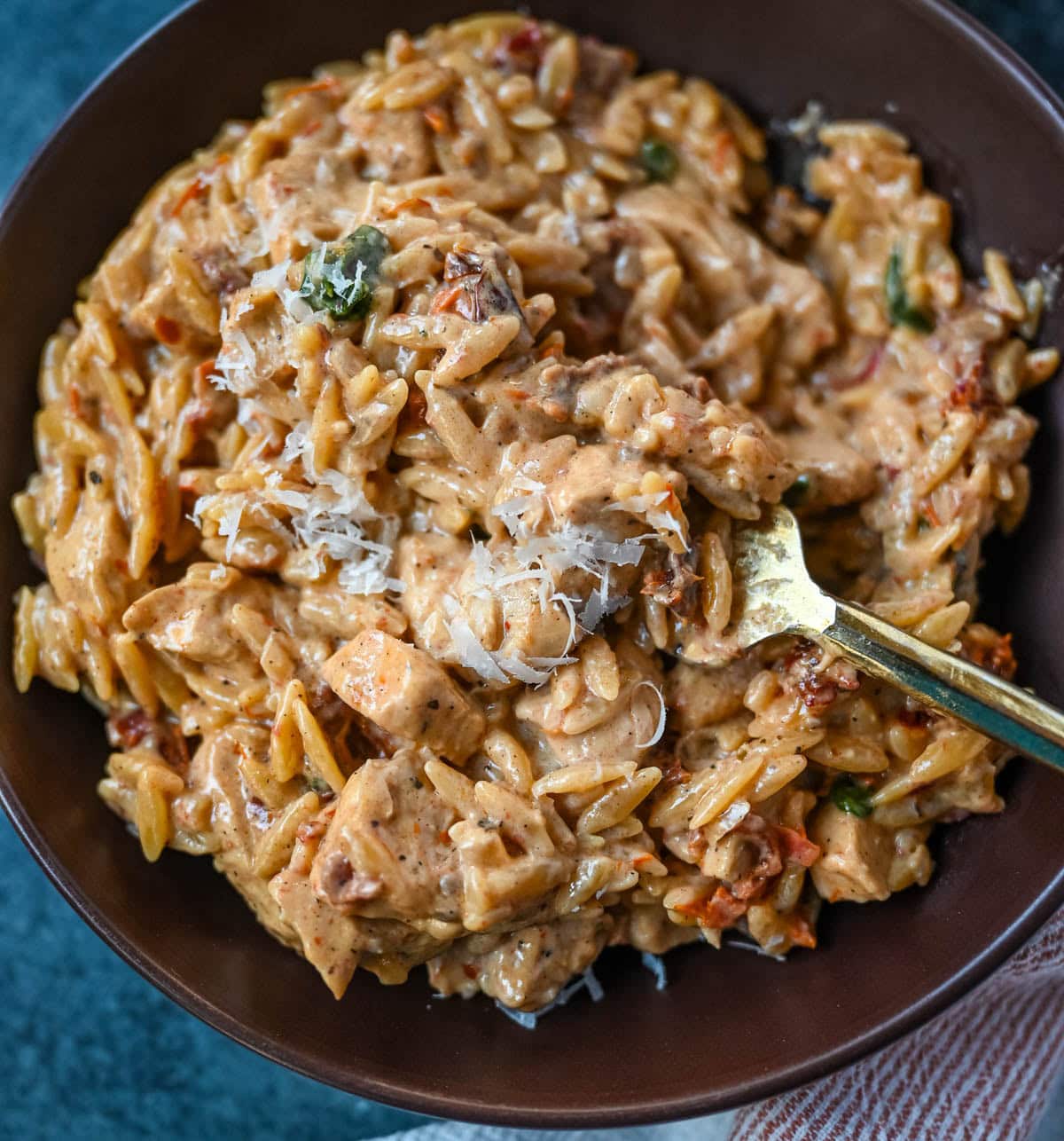 This Marry Me Chicken Orzo is a creamy, one-pan dinner made with tender chicken, sun-dried tomatoes, parmesan, and perfectly cooked orzo pasta. Inspired by the viral “marry me chicken” recipe, this version adds orzo to soak up the rich garlic cream sauce for an easy comfort meal.