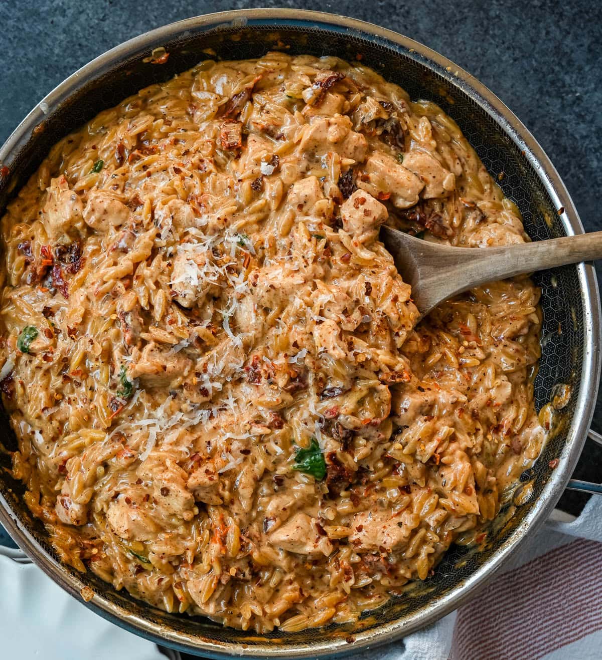 This Marry Me Chicken Orzo is a creamy, one-pan dinner made with tender chicken, sun-dried tomatoes, parmesan, and perfectly cooked orzo pasta. Inspired by the viral “marry me chicken” recipe, this version adds orzo to soak up the rich garlic cream sauce for an easy comfort meal.